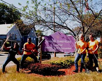 Volunteers doing yardwork